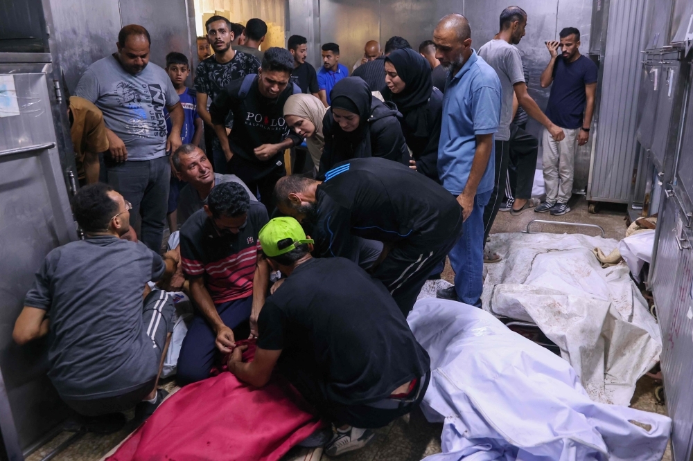 ‘I saw body parts flying everywhere': Gaza rescuers say 51 killed in Israeli strikes as calls for ceasefire grow