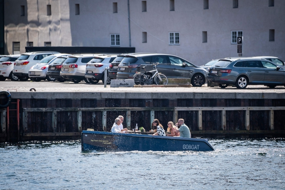 Trash for treats: Copenhagen's CopenPay rewards tourists with free boat rides, concert tickets, and coffee for cleaning canals
