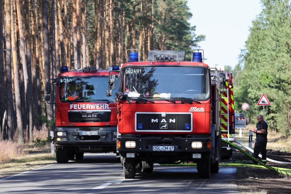 Two die in Spain wildfire, two deaths in France from European heatwave