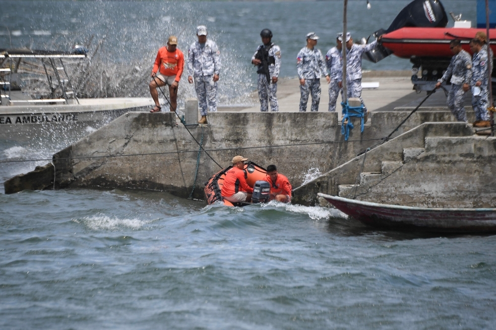 Philippines searches Lake Taal for bodies of cockfighters allegedly killed by rogue cops