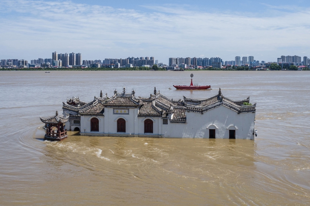 Rivers in southwest China breach flood warning levels, thousands evacuate