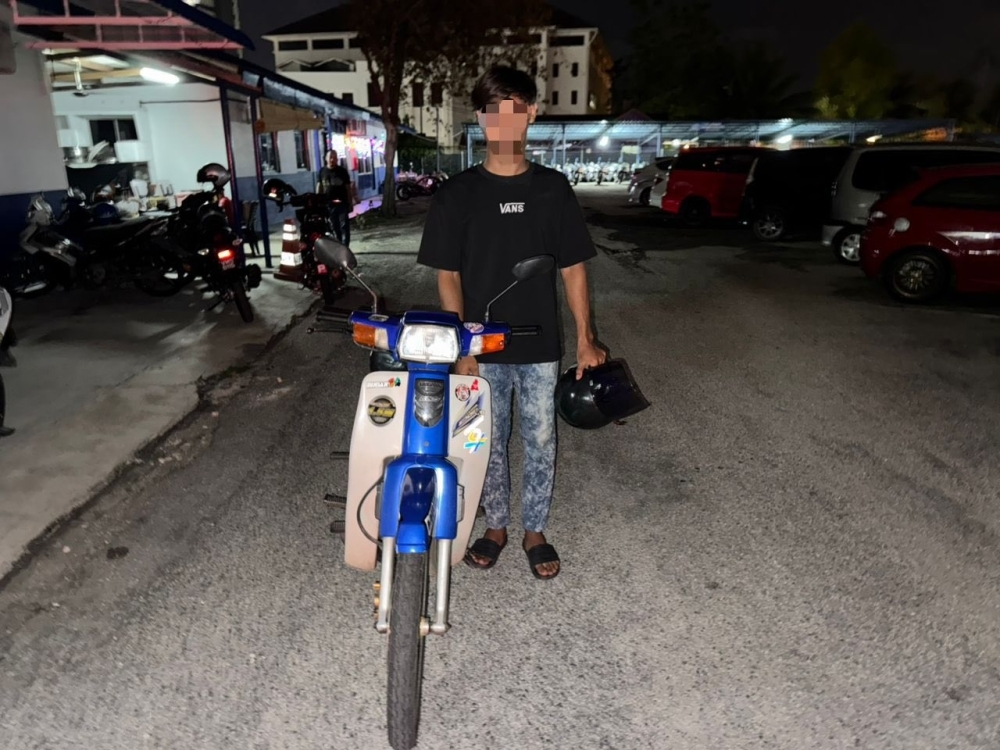 Wheelie stunt near cemetery lands motorcyclist in cuffs as Kuantan police seize 24 bikes