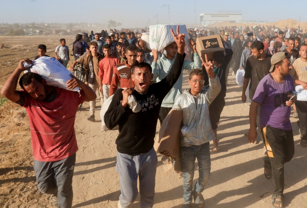 UN says 875 Palestinians have been killed near Gaza aid sites