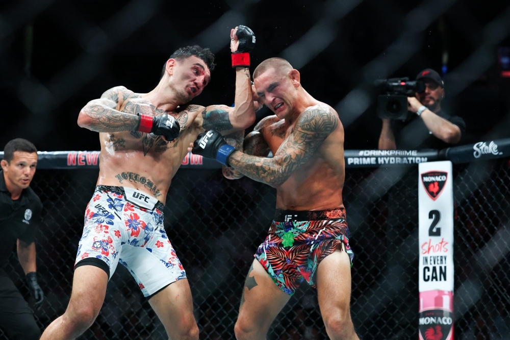 Dustin Poirier ends MMA career in defeat as Max Holloway claims trilogy win at UFC 318