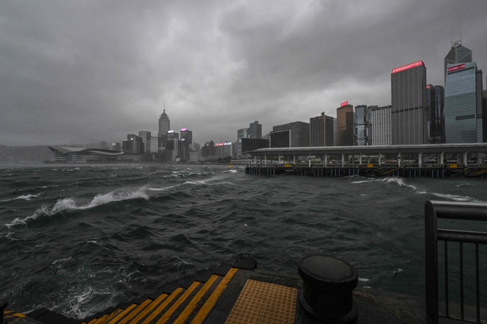 Hong Kong battered by strong winds and heavy rain as Typhoon Wipha skims past