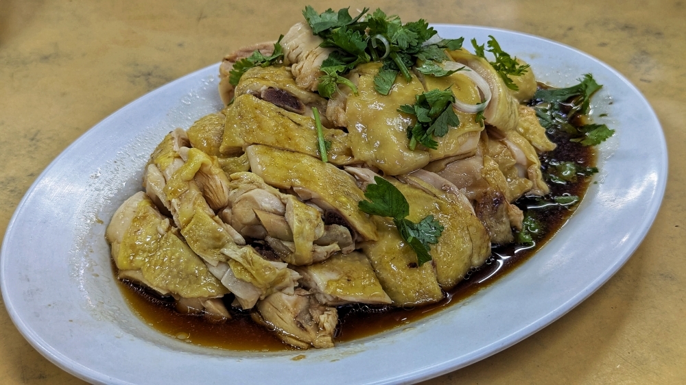 Poached chicken and porridge comforts await at longtime neighbourhood favourite Lian Kee in Subang Jaya