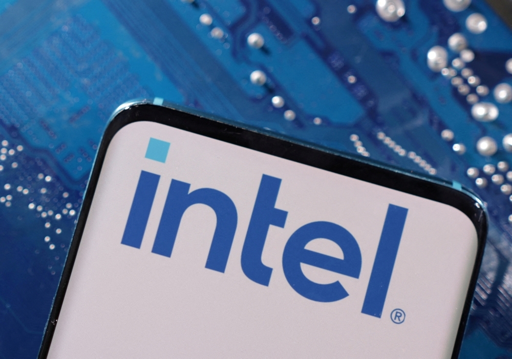 Intel posts higher revenue, cites cost cuts and layoffs