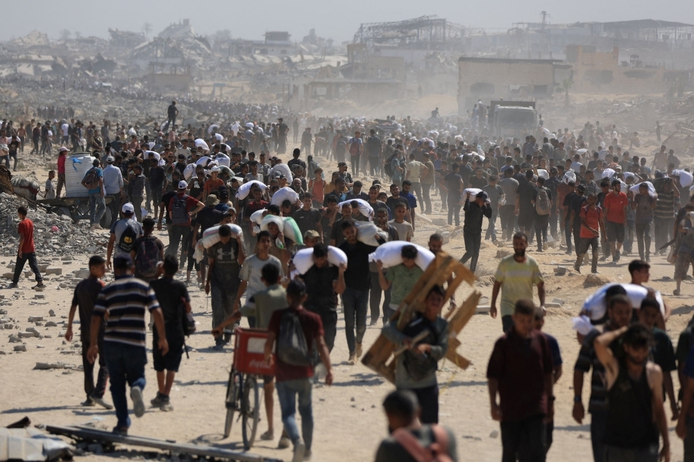 Israel halts Gaza strikes 10 hours daily to allow aid as famine deaths rise