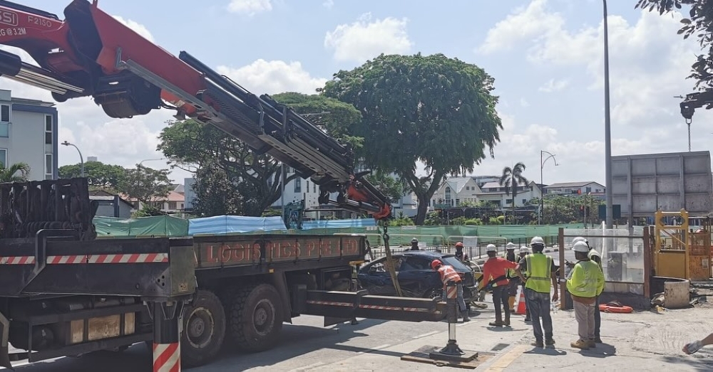 Car lifted from sinkhole in Singapore's Tanjong Katong, road remains closed for repairs