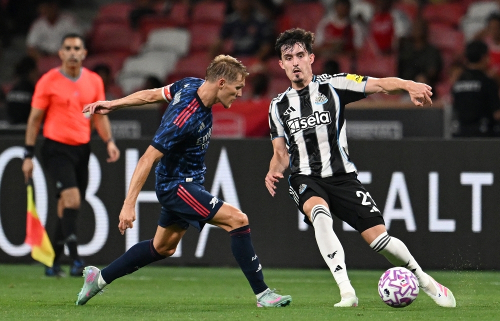 Late Odegaard penalty seals Arsenal's 3-2 win over Newcastle in Singapore pre-season clash