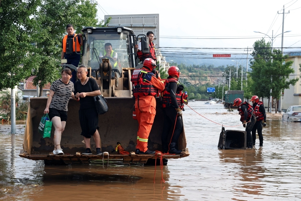 Beijing battered: 30 dead, 80,000 evacuated as relentless rains trigger deadly floods
