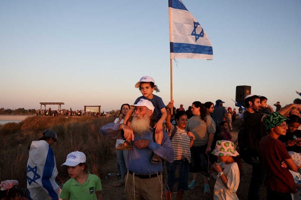 ‘Ours forever': Israeli settlers march on Gaza, dream of return reignited