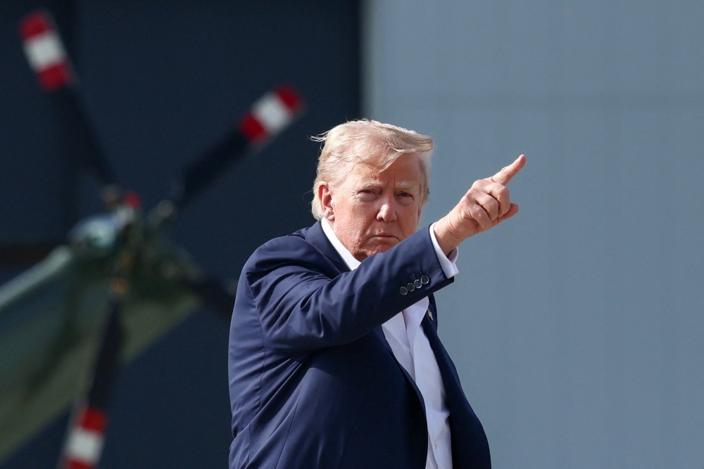 Praise, flattery and role-play: How South Korea won over Trump in trade talks