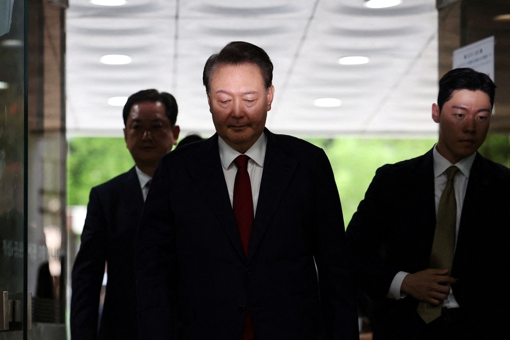 In his briefs, not briefed: Impeached S. Korea ex-president Yoon resists probe lying half-naked in cell