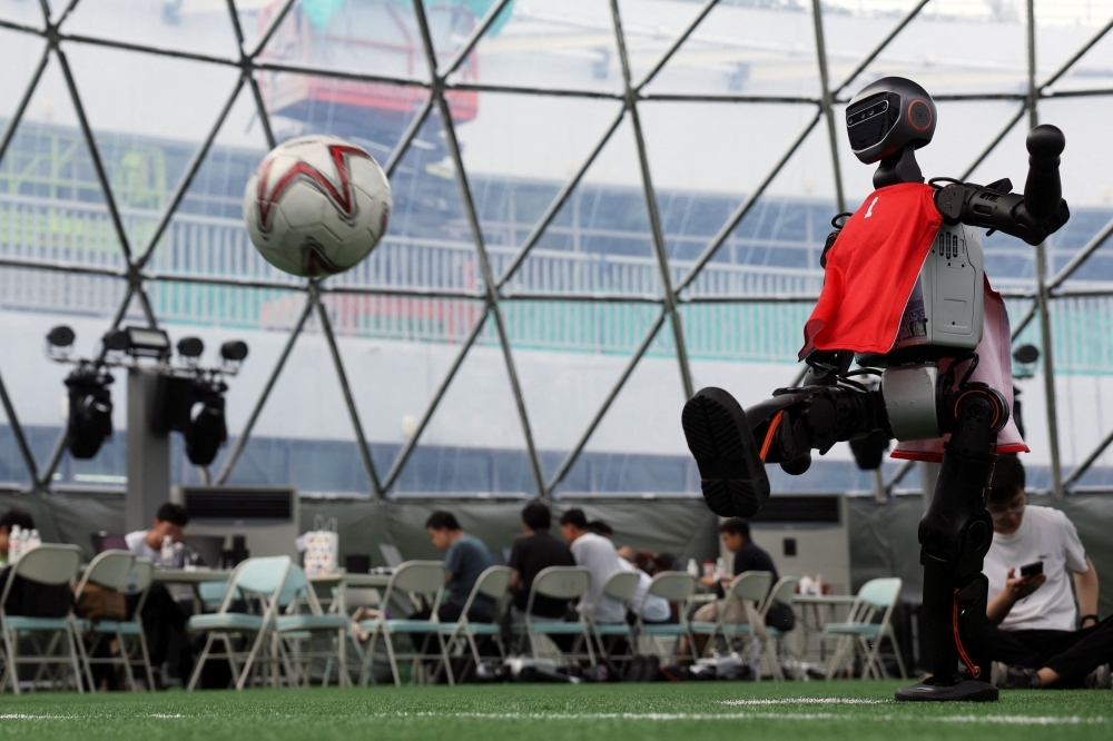 Man of the match? Try machine: China's T1 takes the pitch for robot world cup