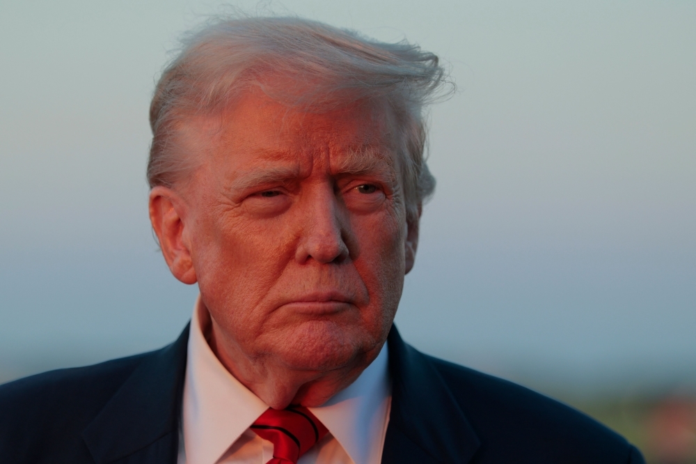 India vows to defend interests after Trump threatens tariff hike over Russian oil