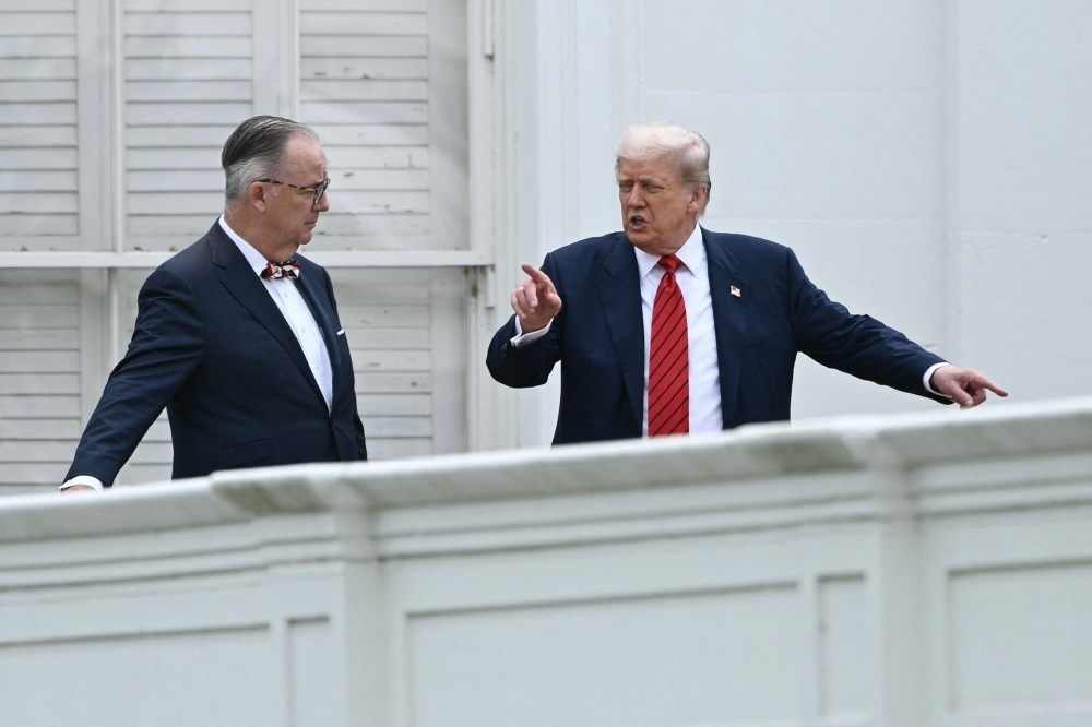 Trump jokes about ‘nuclear missiles' during surprise rooftop stroll at White House