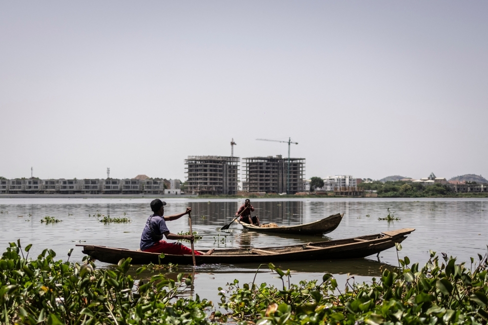 Paddling against the tide: Nigeria's traditional fishermen fight to stay afloat in fast-growing Abuja