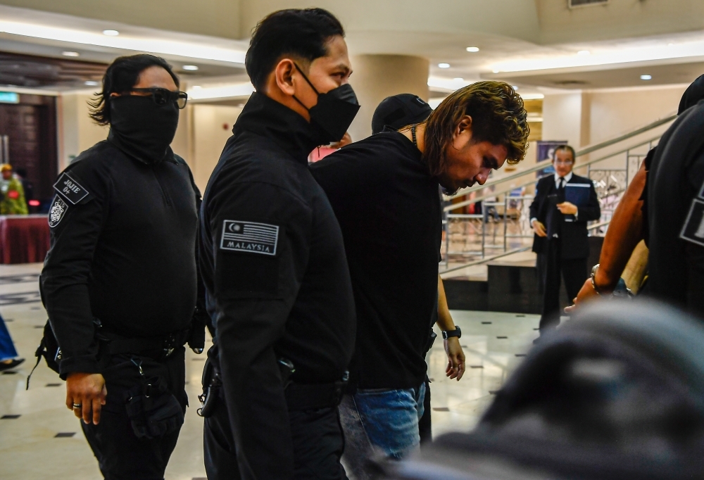 Two friends plead not guilty to robbing Chinese national of RM2.1m in Bukit Damansara
