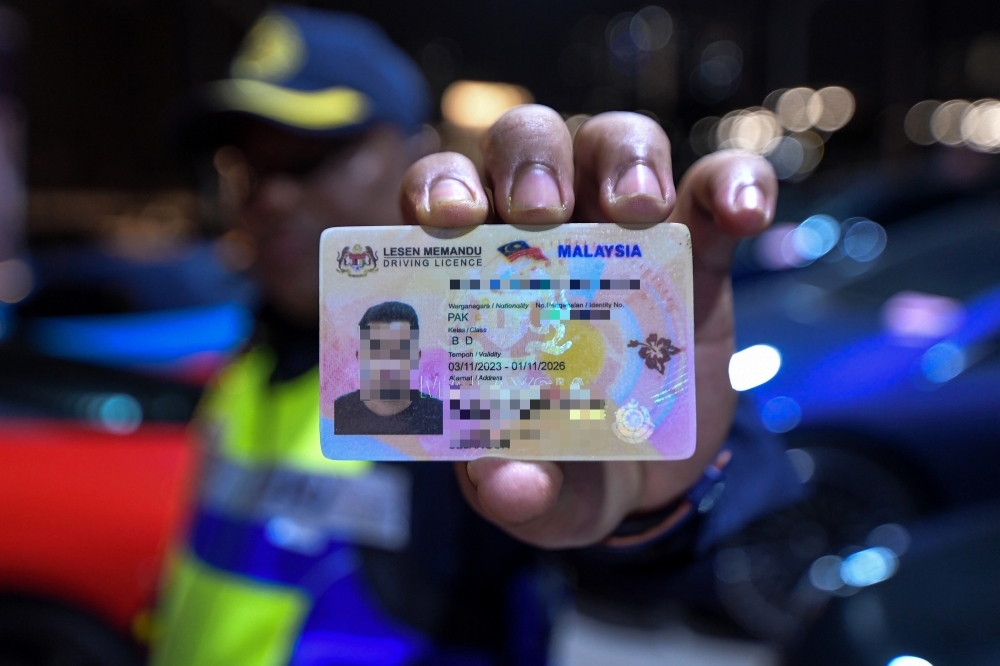 JPJ smells a syndicate after foreigner caught with fake Malaysian licence in flashy ride