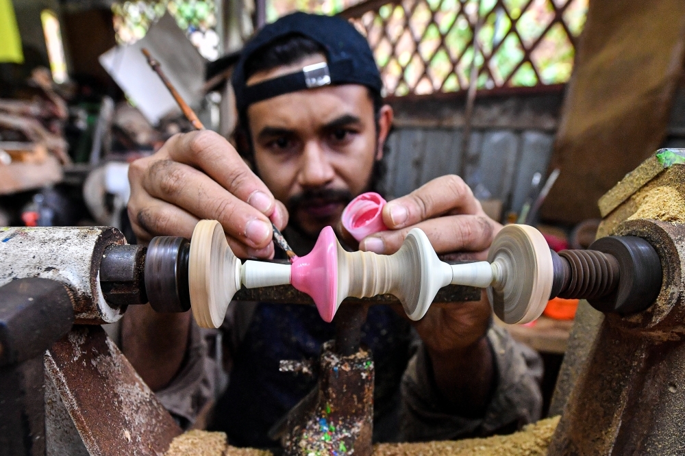 From discarded wood to global showcases: Orang Asli entrepreneur carves path to success