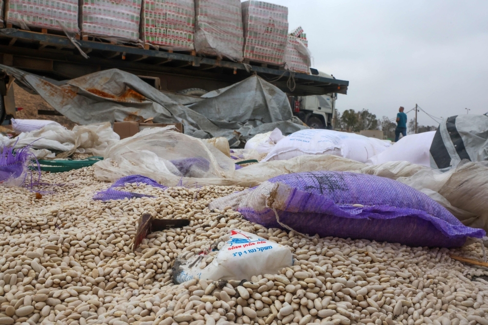 Stalled at Rafah: Turned back from Gaza, aid shipments languish in warehouses and roadsides as Palestinians starve