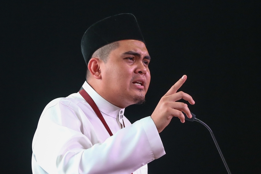 Penang DAP to file police report over ‘illegal' Umno Youth-led rally on upside-down flag controversy