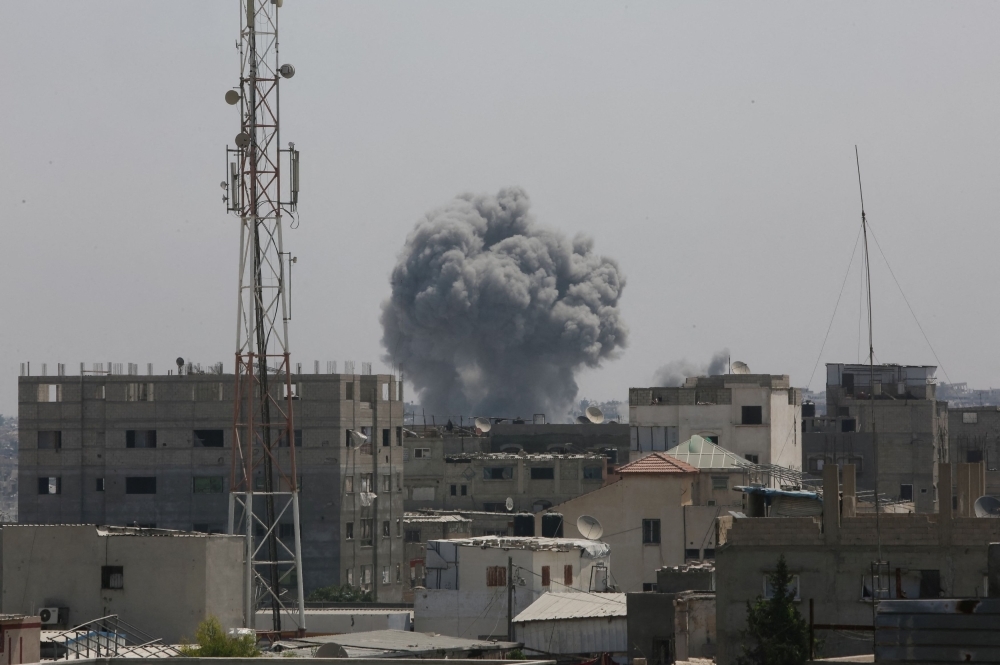 Gaza officials say Israeli strikes kill 17, including civilians waiting for aid