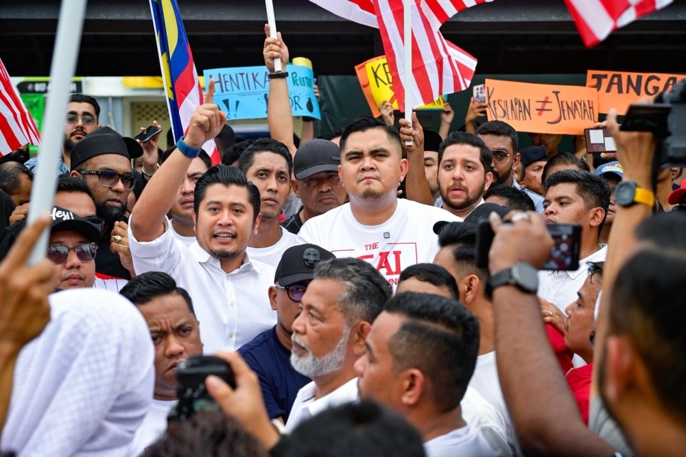 AGC warns Malaysians against vigilantism in Jalur Gemilang offence after Umno Youth's Kepala Batas protest
