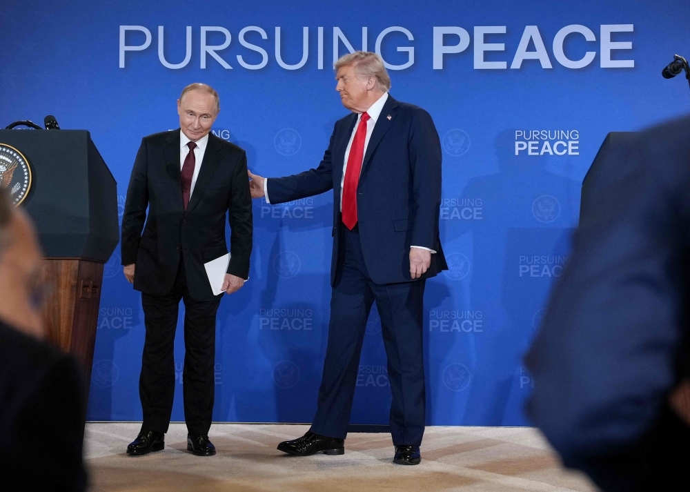 Made-for-TV pageantry as Trump brings Putin in from cold