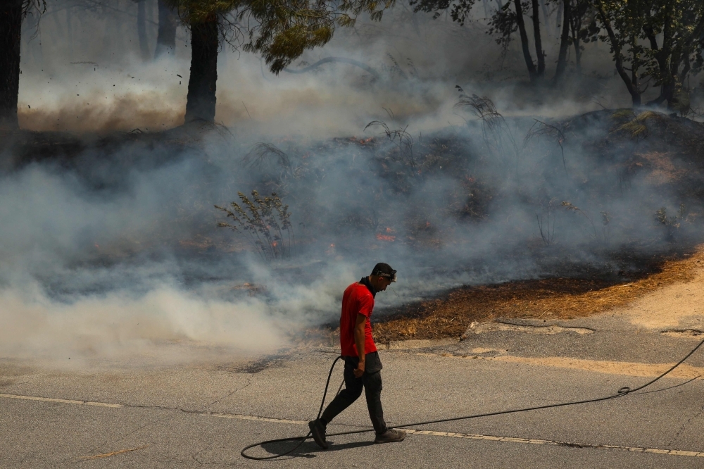 Portugal faces first fatality as wildfires rage across Southern Europe amid heatwave