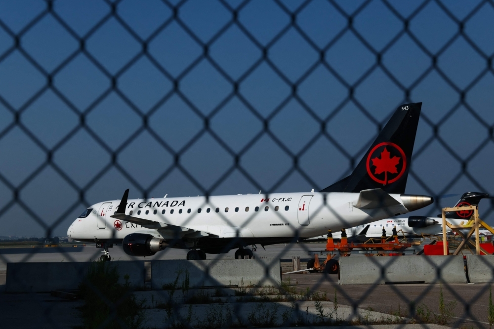 Canadian government moves to end Air Canada strike, seeks binding arbitration