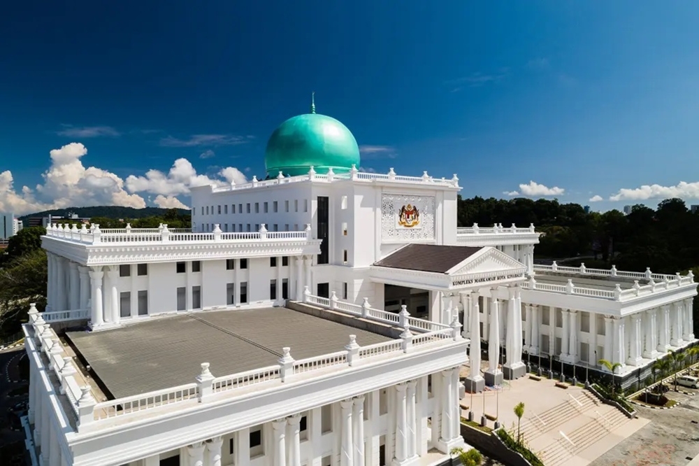 Five teenage girls arrive in Kota Kinabalu's Children's Court to face bullying charges, as inquest into Zara Qairina's death looms