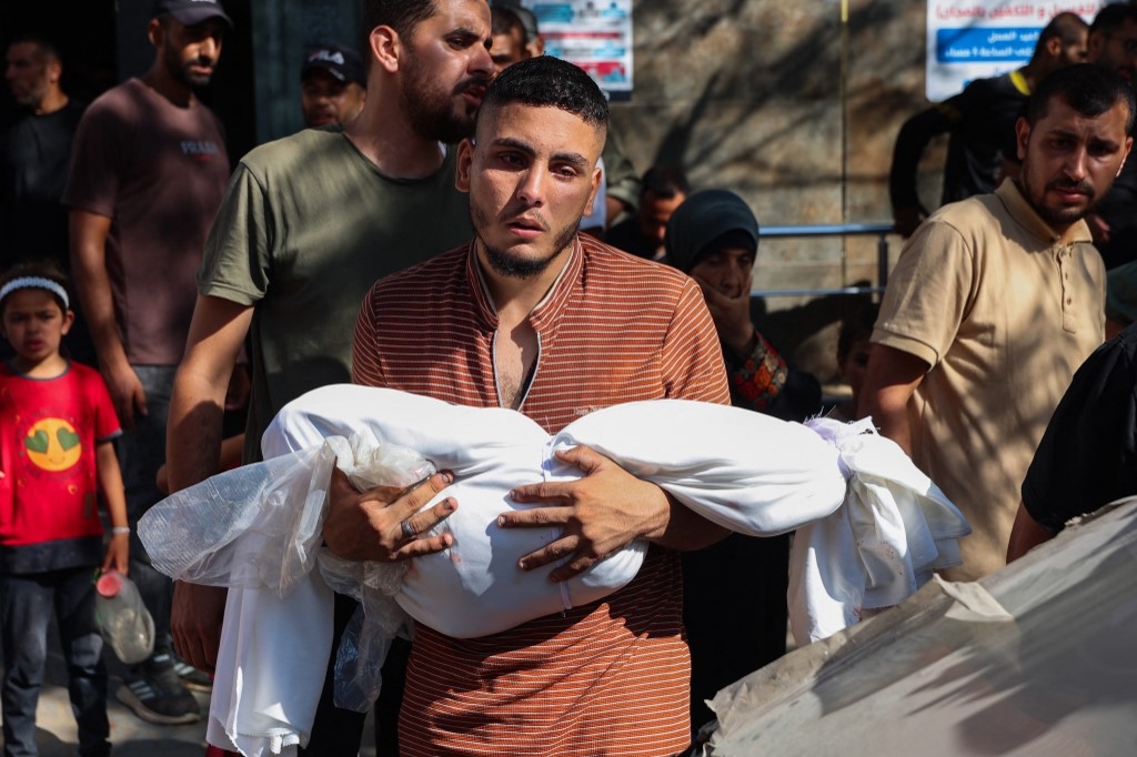Death toll climbs to 31 in Gaza, including 13 killed while seeking aid
