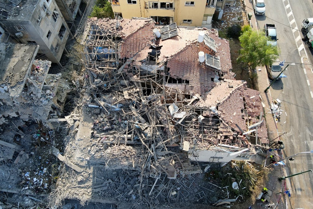 In pictures: Iranian retaliatory strikes cause extensive damage in Israel