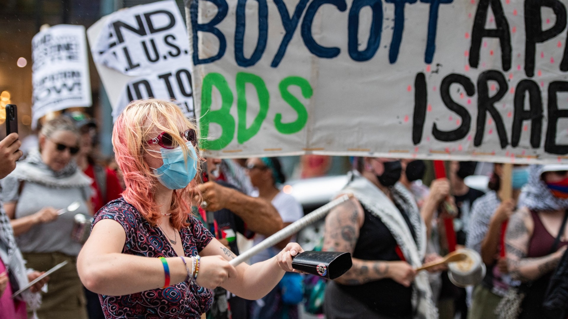 Why are people protesting against the Boston Consulting Group?