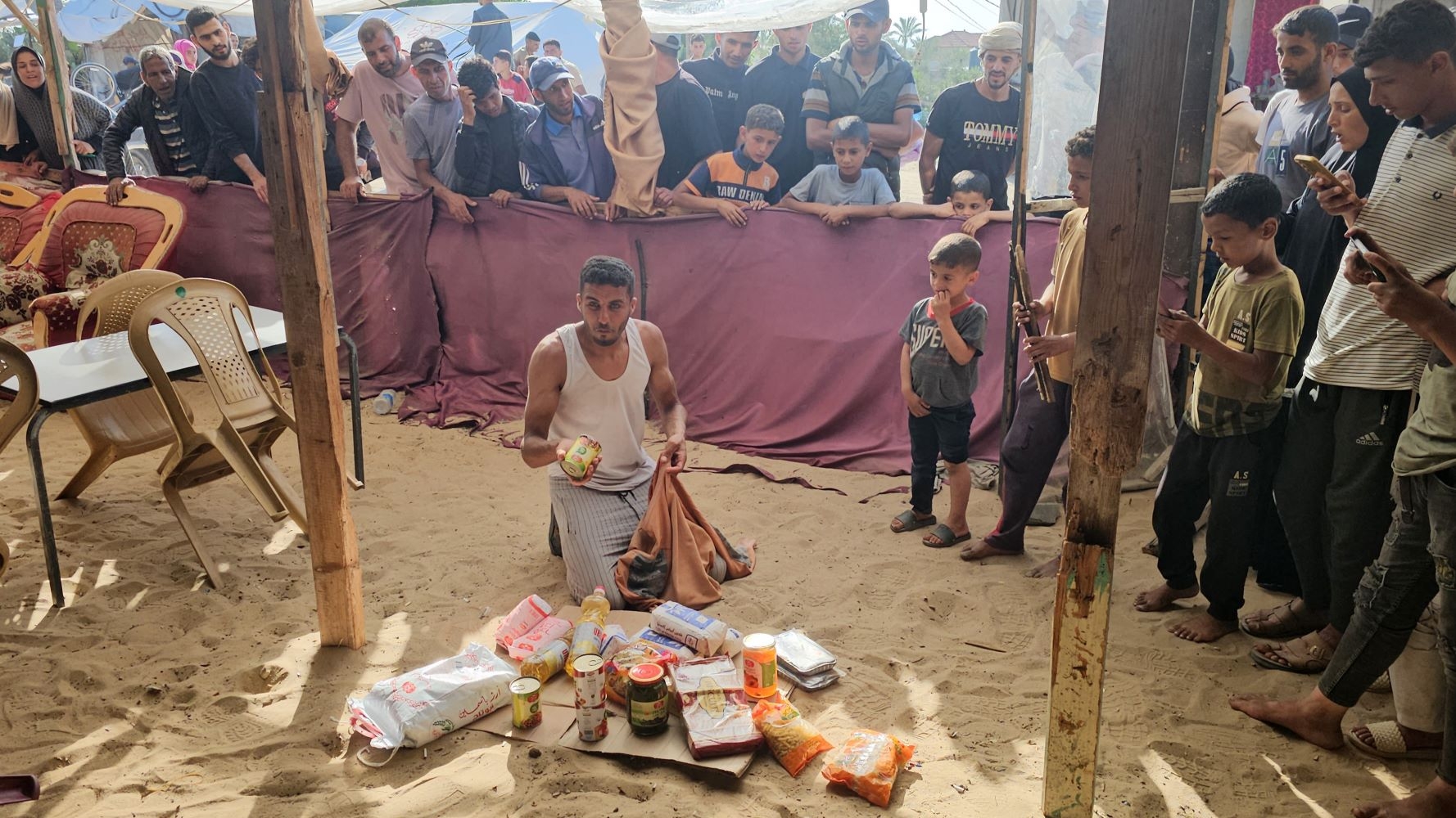 Starving Palestinians storm US aid facility as distribution operation breaks down
