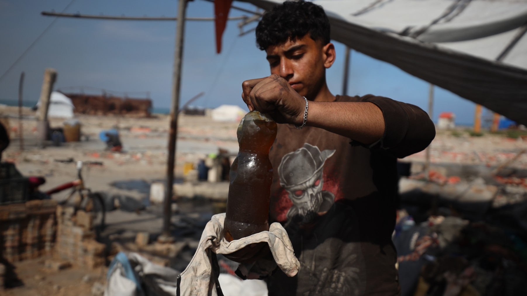 Israeli-besieged Gaza residents turn plastic waste to fuel