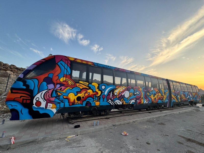 Art on track: Al Hoota's old train gets vivid makeover