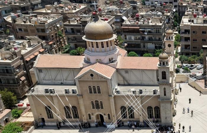 أخبار العالم : مصر.. ساويرس يعلق على فيديو رفع صليب في سوريا بمظاهرات بعد هجوم الكنيسة
