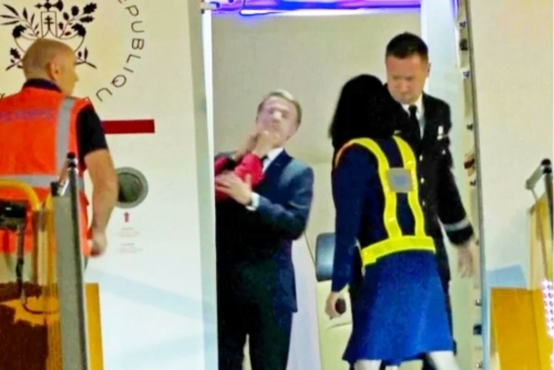 Macron's office downplays plane incident with wife