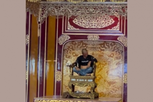 Vietnam police detain man over damage to ancient throne