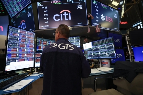 Stocks climb as strong US jobs data pushes off rate hike