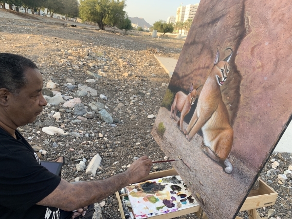 Caracal on canvas: winter makes perfect time for an artist