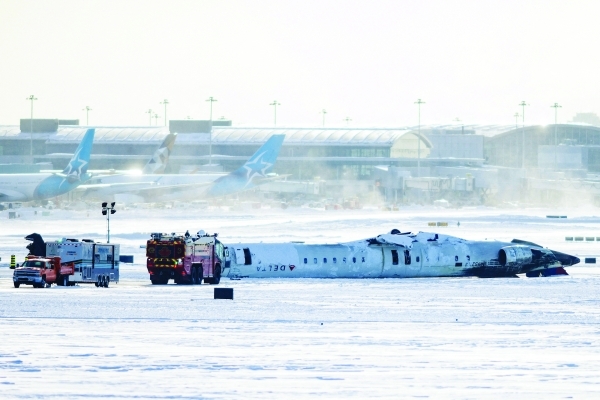 Delta plane flips upside down on landing at Toronto airport