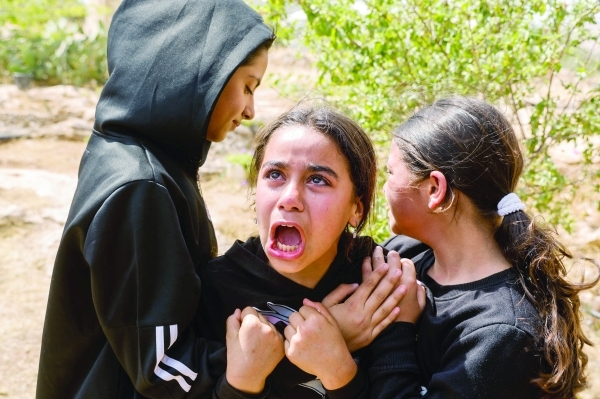 Israeli military strikes kill scores in Gaza Strip