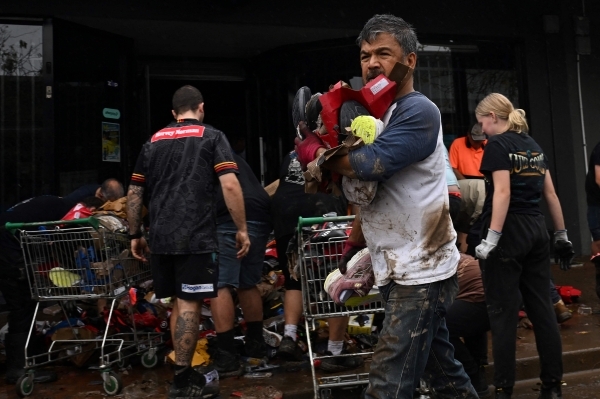 Australia victims confront damage after deluge