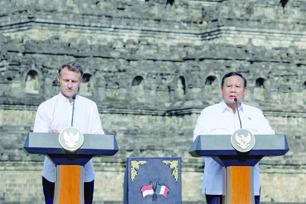 Macron decorates Indonesia leader, announces cultural partnership