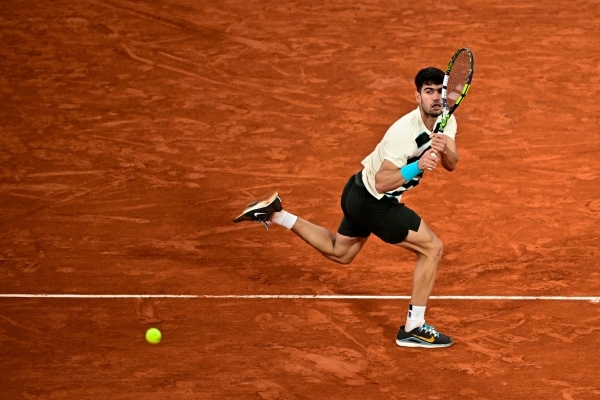 Alcaraz returns to French Open final after ailing Musetti retires