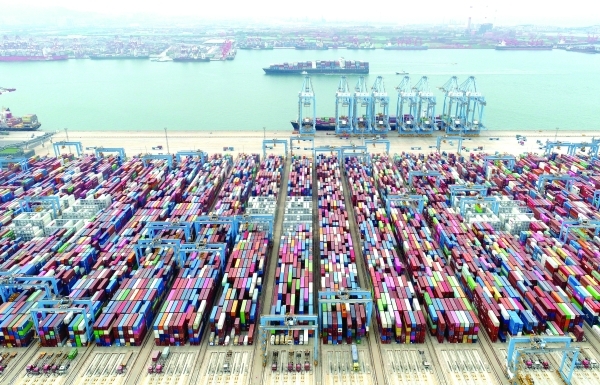 China's exports slow as trade war takes toll